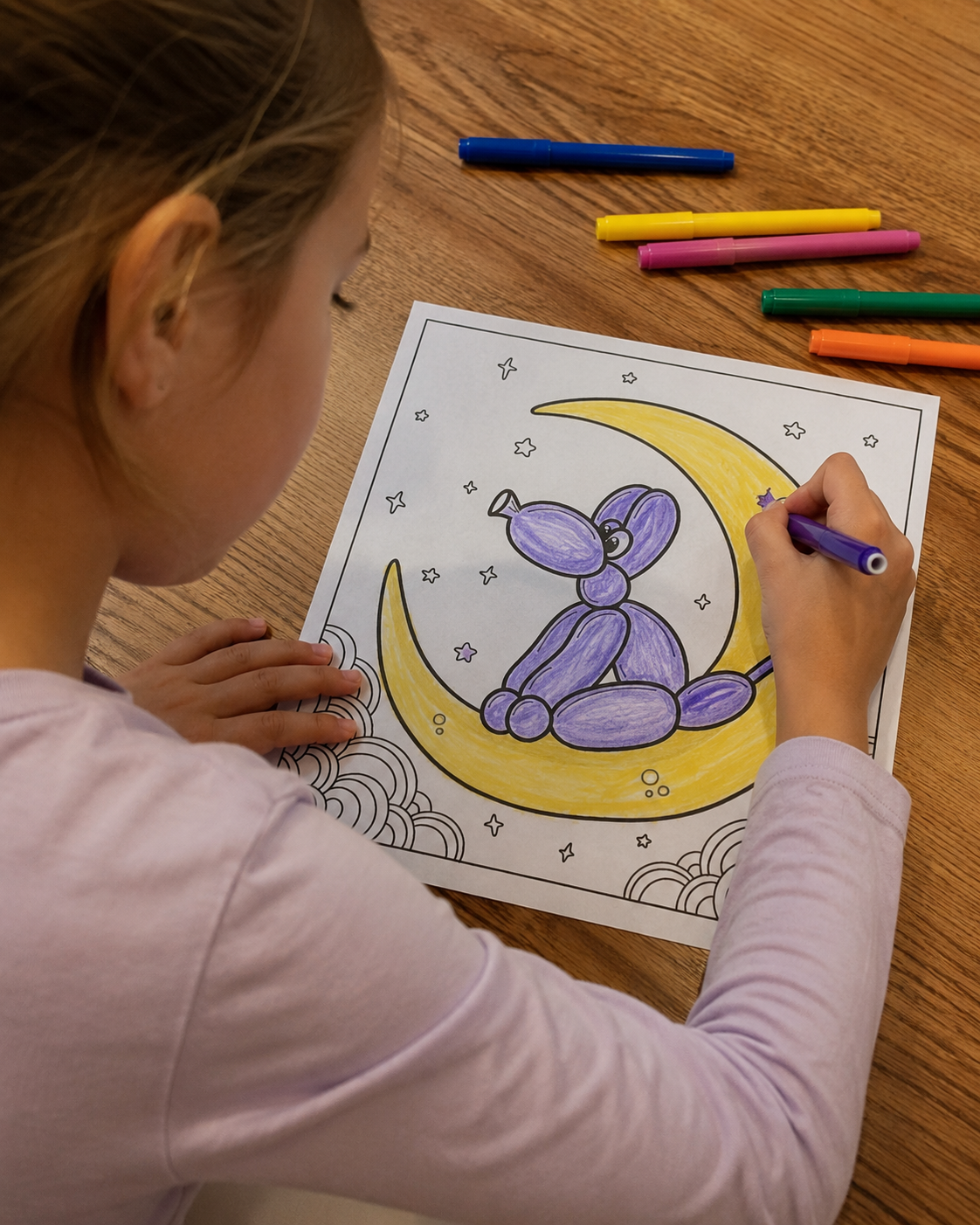 Child coloring a balloon animal coloring page